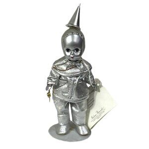 Madame Alexander restrung 8" Tin Woodsman doll with stand.